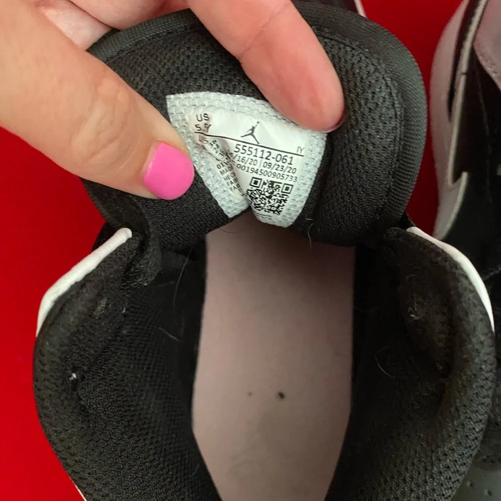 Nike Women’s Black and White High-Top Sneakers